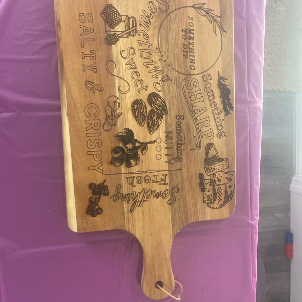 Beautiful charcuterie board made by me! Great accessory for anyone .